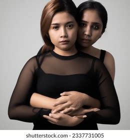 Studio Shot Photo Filipino Lesbian Hugs AI Generated Image 2337731005 Shutterstock