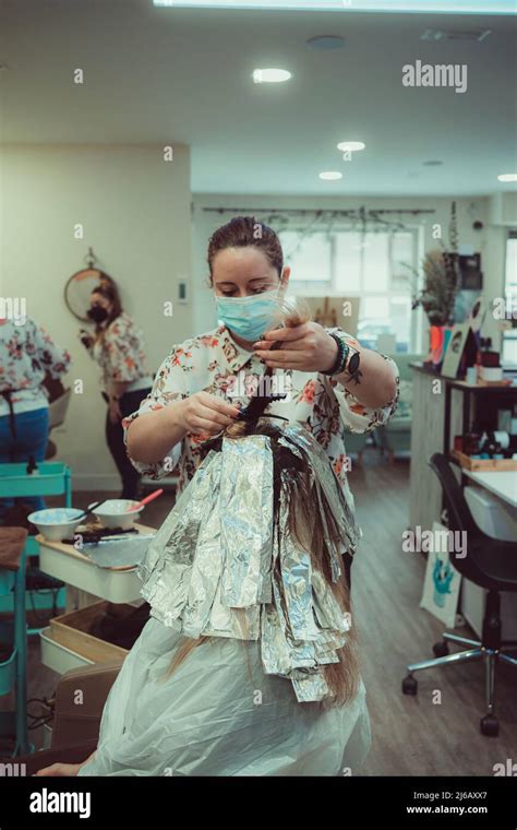 Blonde Woman Dying Her Hair In Beauty Salon Close Up Of Her Hair Coloring Stock Photo Alamy