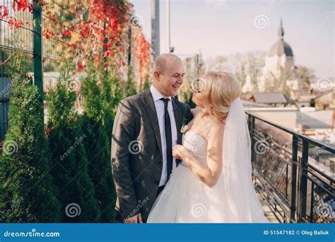 Blonde Bride With Her Groom Stock Photo Image Of Fashion Interior