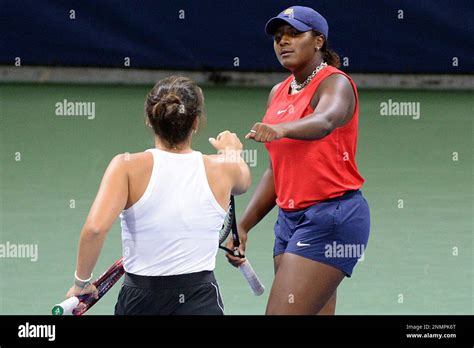 Emma Navarro And Hailey Baptiste React During A Women S Doubles Match