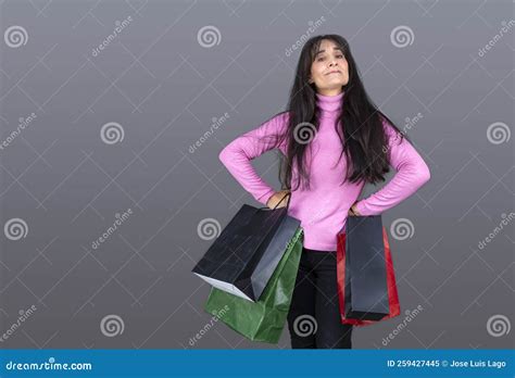 Cute Brunette Woman With Gift Bags And Funny Expression Stock Image Image Of Carrying Beauty
