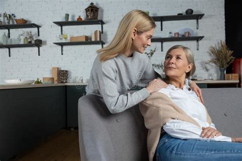 Mature Mother And Her Adult Daughter Hugging And Talking Stock Photo Image Of Person