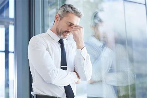 Premium Photo Window Business Man And Stress With Headache Burnout And Overworked In Office