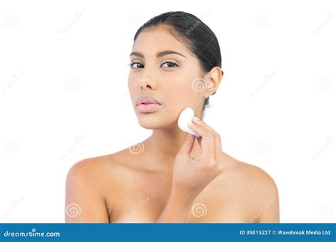 Unsmiling Nude Brunette Holding Cotton Ball Looking At Camera Stock Image Image Of Cute