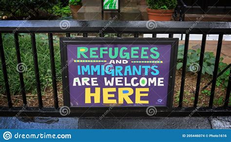 Sign Welcoming Immigrants And Refugees Editorial Stock Image Image Of