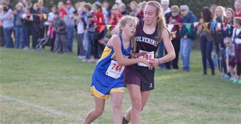 High school runner disqualified for helping foe finish race