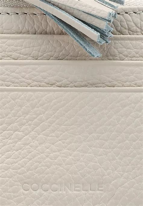 Jual Coccinelle Tassel Card Holder Original 2024 ZALORA Indonesia