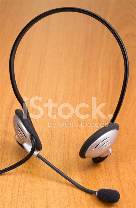 Headset On Desk Stock Photo Royalty Free Freeimages