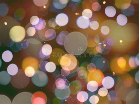 Multi Colored Glowing Round Blurred Lights Night Abstract With Sparkle