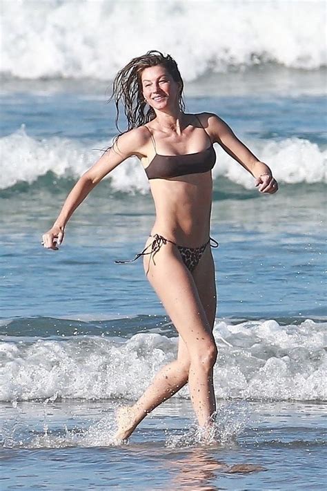 Gisele Bundchen Has Fun On The Beach In A Revealing Bikini Photos The Fappening