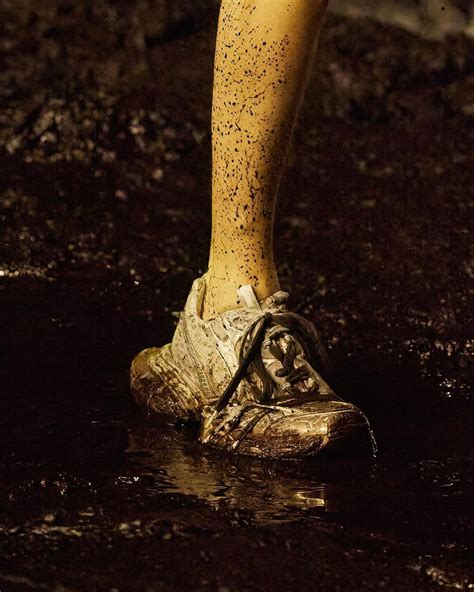 Balenciaga Holds Fashion Show In Muddy Pit Reminds Us Of Scenes From