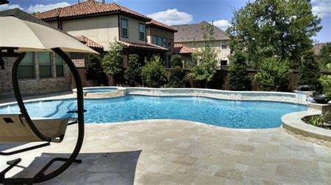 Freeform Travertine Pool With Negative Edge Traditional Swimming