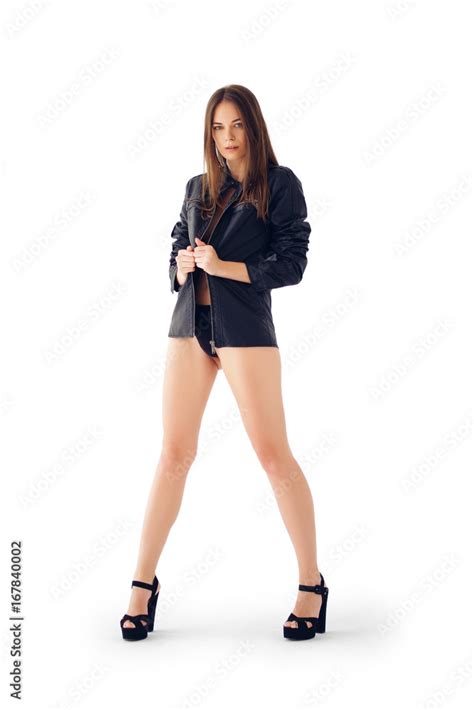 Attractive Girl Posing On White Background In Lingerie And Leather