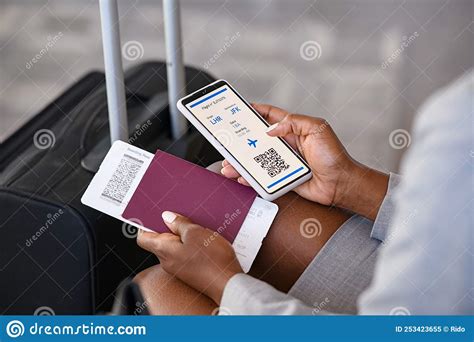 Close Up Of Business Woman Checking Flight E Ticket On Phone At Airport Stock Image Image Of