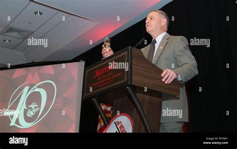 Rick Nealis Race Director For The Marine Corps Marathon Toasts To The