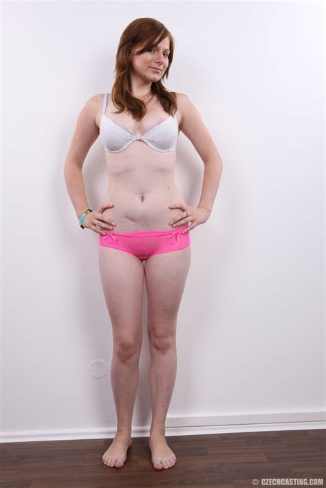 Redhead Amateur Sabrina Stands Naked With Hands On Hips During A Solo Gig NakedPics