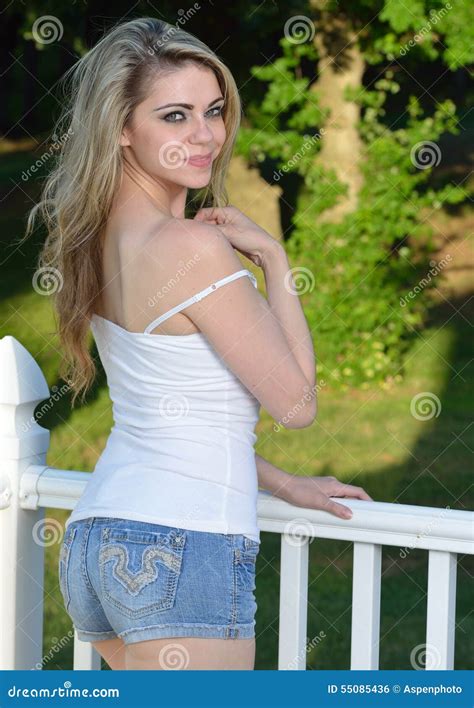 Blonde Female Model Poses In Denim Shorts Stock Photo Image Of Woman