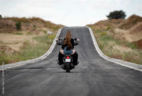 Sexy Woman Wearing With Blonde Long Hair Riding A Street Motorbike Outdoors Exploration Journey