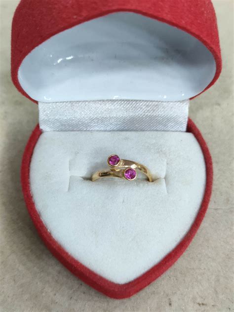 Cincin Bayi Model Silang Mata Merah 1 2 Gram Emas Muda Lazada Indonesia