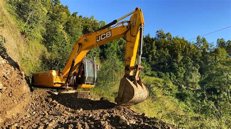 Heavy Excavator Clearing Landslide And Repairing Road Jcb Excavator