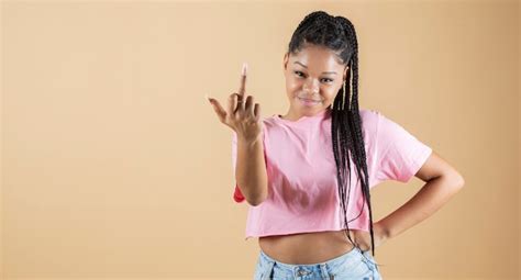 Premium Photo Woman Makes Obscene Gesture With The Finger Fuck You