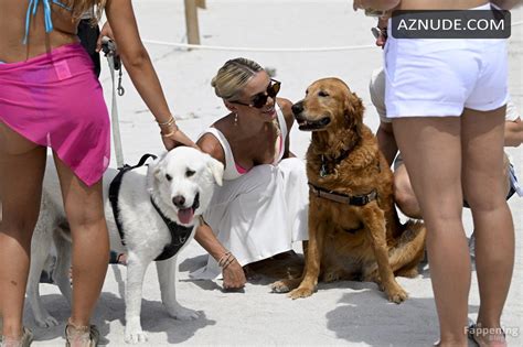 Olivia Dunne Sexy Shows Off Her Hot Cleavage And Figure At The Sports Illustrated Swimsuit Beach