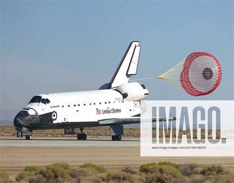 A Drag Chute Slows The Shuttle Endeavour After Landing On Runway 22 At