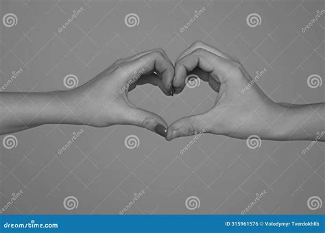 Female And Male Hands In Form Of Heart Hands In Shape Of Love Hearts