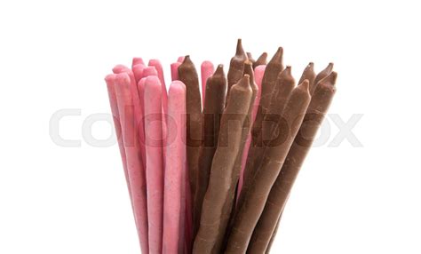 chocolate covered sticks isolated | Stock image | Colourbox