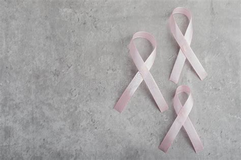 Pink Ribbon on Gray Background.Symbol of Breast Cancer Stock Photo ...