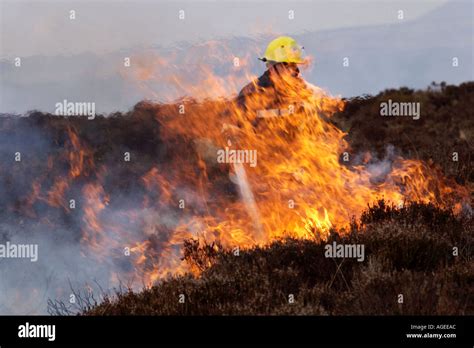 fireman uk firefighter high resolution stock photography  images alamy