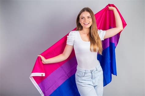 Premium Photo Blonde Brazilian Woman With Lgbt Bisexual Flag