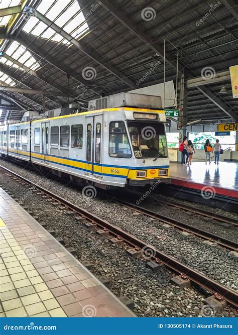 Manila, Philippines - JULY 19, 2015 : LRT Train Arrives At A Train ...