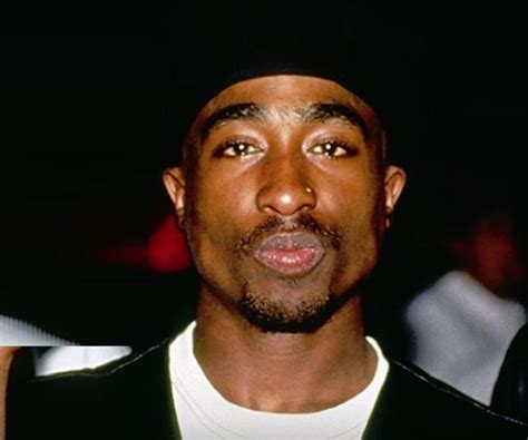 Tupac Shakur Biography - Childhood, Life Achievements & Timeline