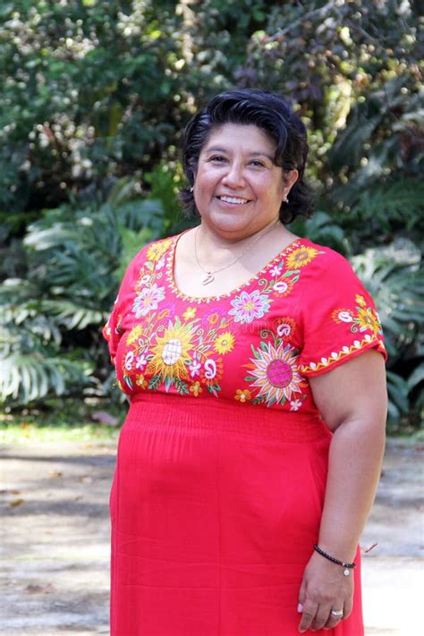 Overweight Brunette Latina Adult Woman In Her 50s Is Happy And Proud Of Her Roots Wearing