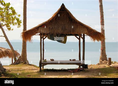 Tropical beach hut in Thailand Stock Photo - Alamy