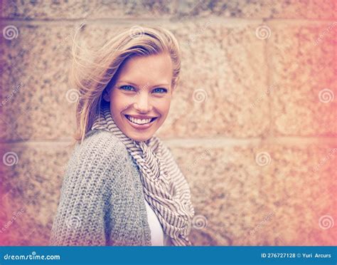 Im A City Girl Cropped Portrait Of An Attractive Young Woman Standing Outside Against A Brick