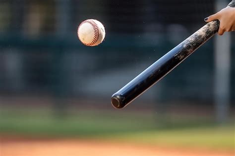 Premium Ai Image Baseball Bat And Ball On The Background Of A