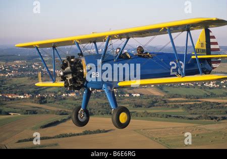 An Aerial View Of A Wwii Boeing Stearman Biplane Pilot Trainer In Black