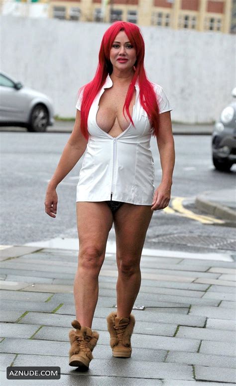 Lisa Appleton Sexy In A Red Wig For Local Sex Shop Saint And Sinners Photo Shoot In Blackpool
