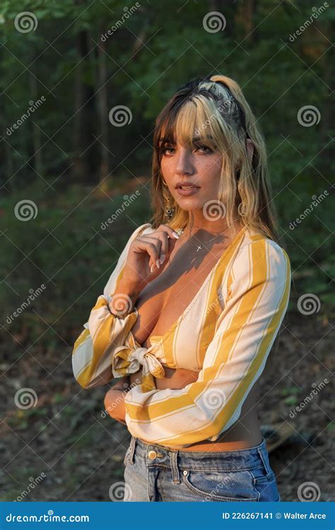 A Lovely Brunette Model Poses Outdoor While Enjoying The Fall Weather Stock Image Image Of
