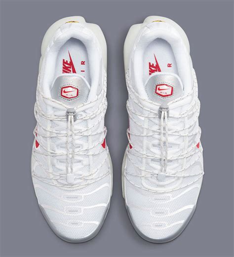 The Nike Air Max Plus Toggle Appears In White Silver And Red