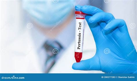 Doctor Holding A Test Blood Sample Tube Positive With Pertussis Test