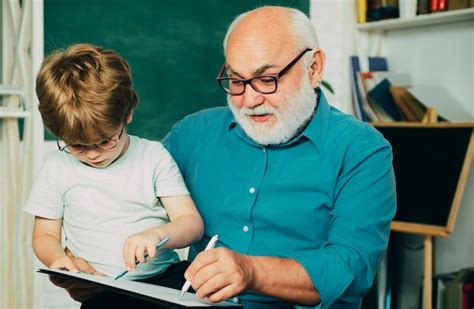 Premium Photo Portrait Of Grandfather And Grandson On Blackboard In