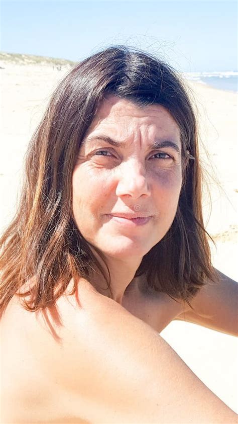 Beach Summer Beach Portrait Of Middle Aged Beautiful Year Old Brunette Woman Stock Photo