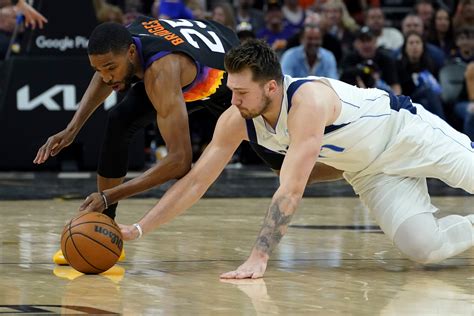 Luka Doncic Held Back From Suns Fan After Reckless Taunt