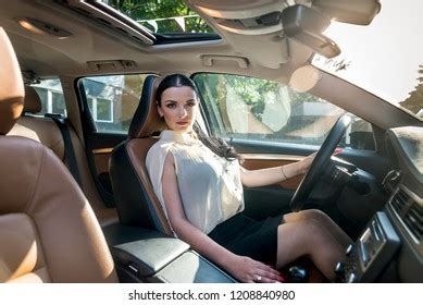 Beautiful Brunette Woman Posing Inside Car Stock Photo Edit Now 1199218030
