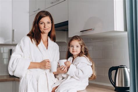 Mom And Daughter Drinking Tea Stock Image Image Of Homely Happy