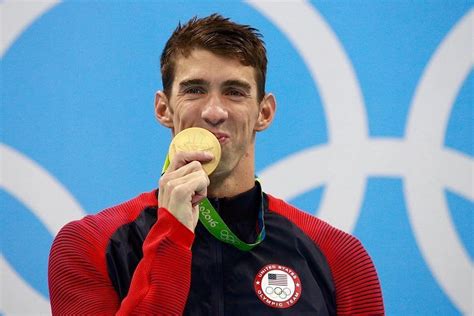 What is Michael Phelps wingspan? Explore Michael Phelps ’s Height