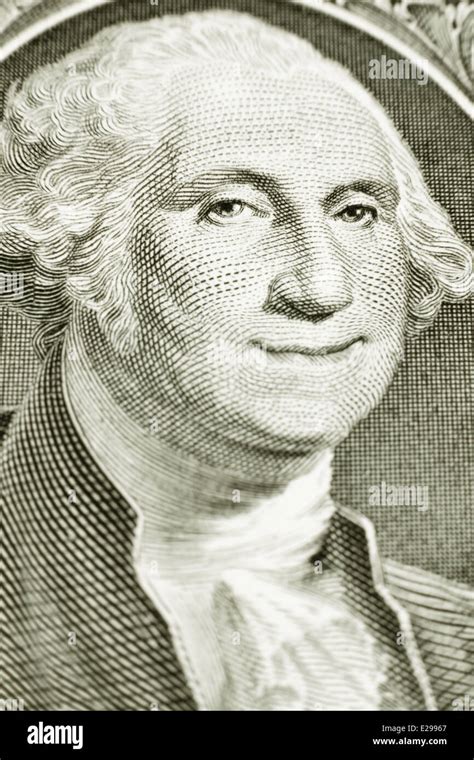 A Smiling George Washington On A One Dollar Bill Close Up Stock Photo